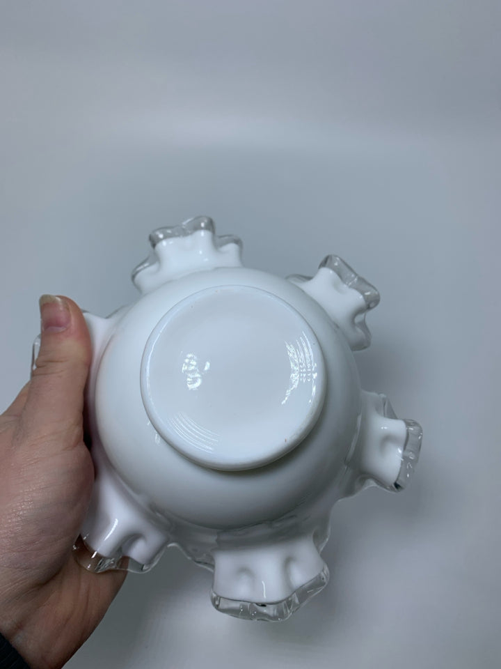 FOOTED MILK GLASS CANDY DISH W/ RUFFLED EDGE.
