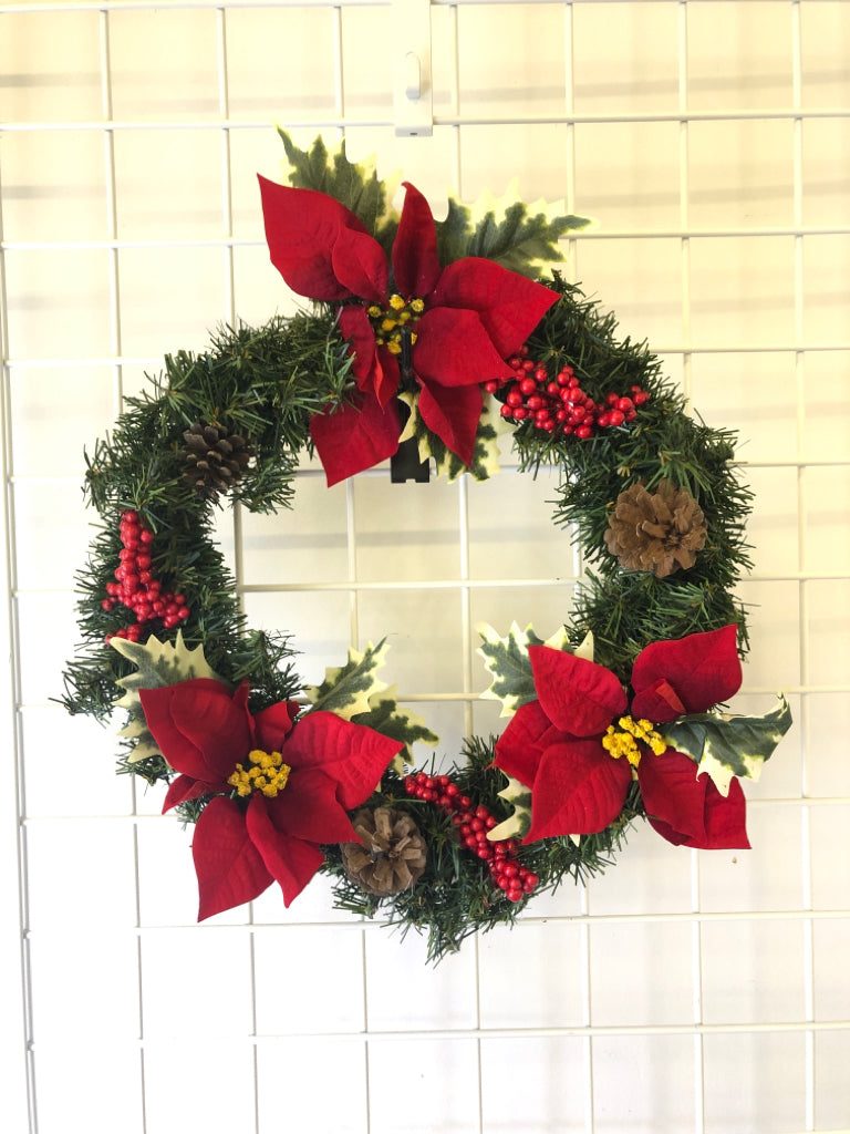 POINSETTIA AND PINE CONES WREATH DOOR HANGING.