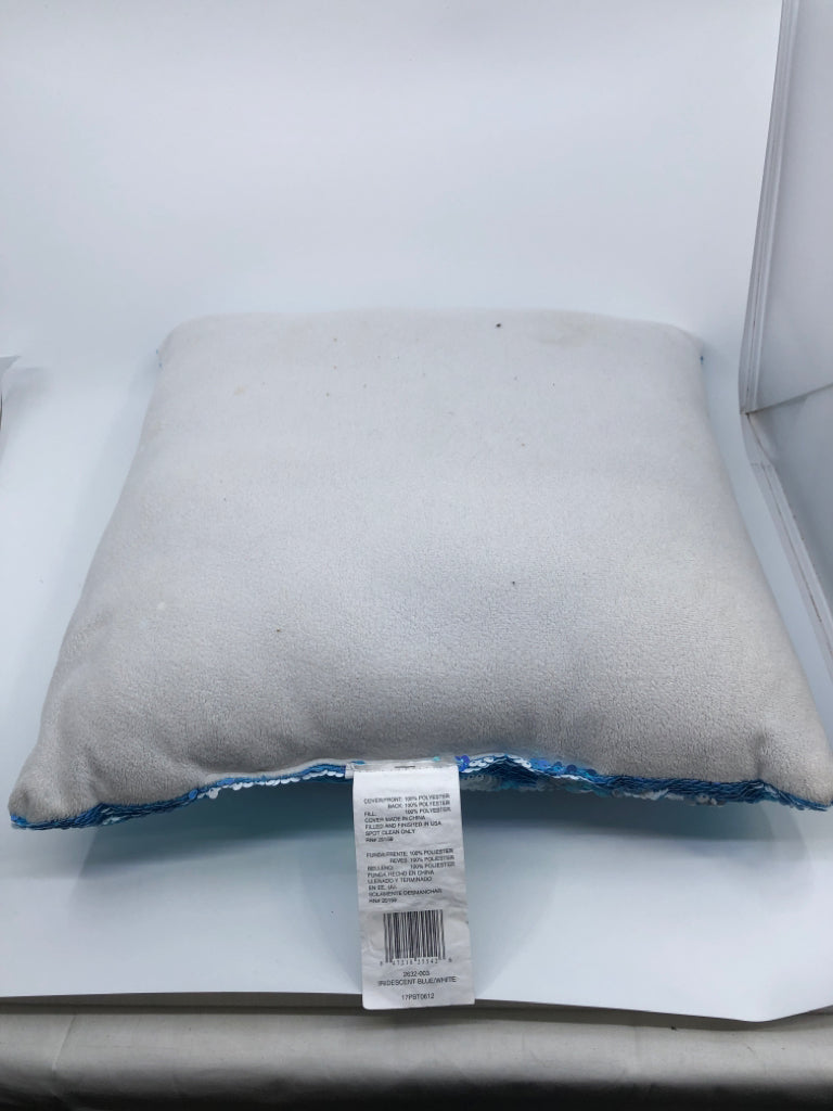 LIGHT BLUE AND WHITE SEQUINS PILLOW.