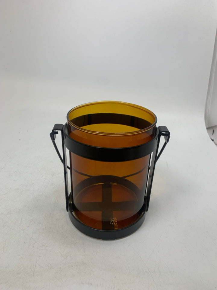 BROWN GLASS INSERT W/ BLACK METAL STAND LANTERN.