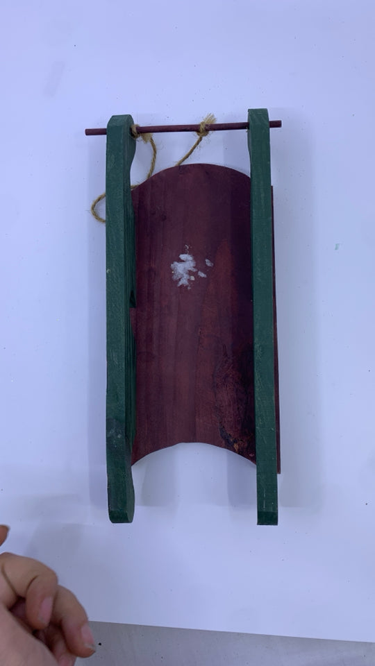 RED/GREEN SNOWMAN HANGING SLED.