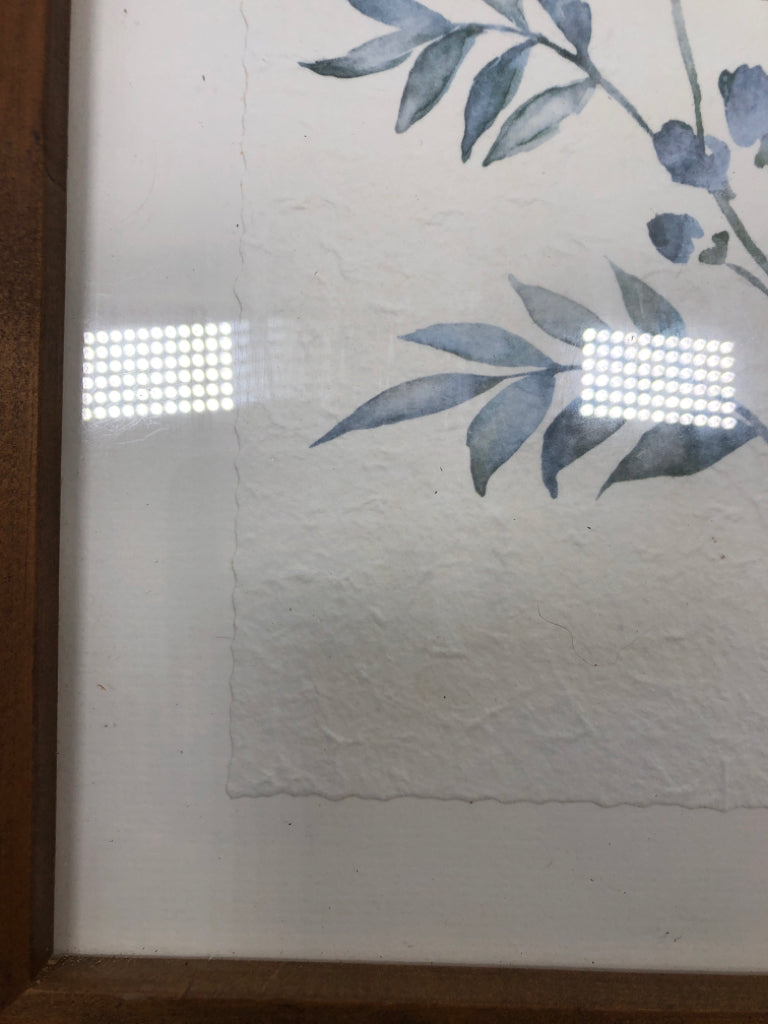 BLUE FLORAL FRAMED PAPER WALL HANGING.