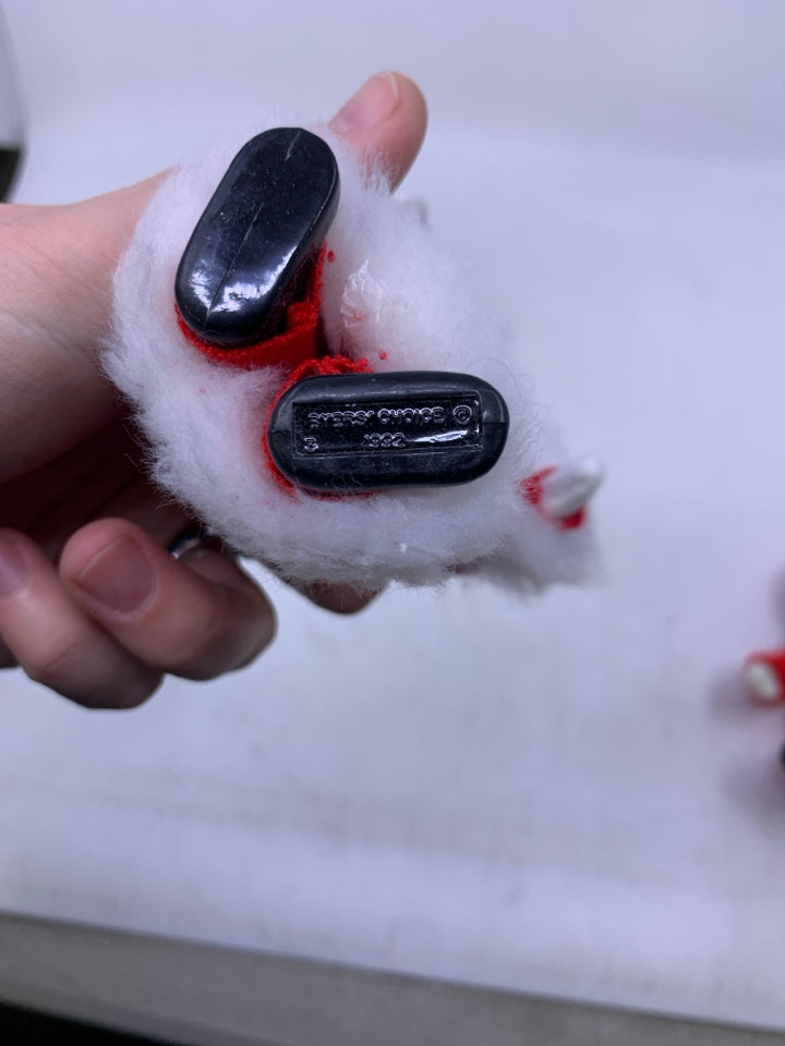 KID HOLDING CHRISTMAS TREE BYERS' CHOICE 1992.