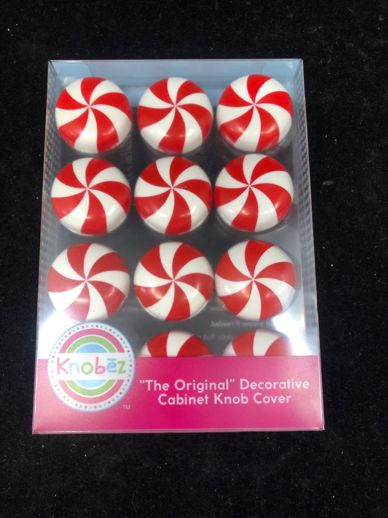 NIB CANDY CANE KNOB COVERS.