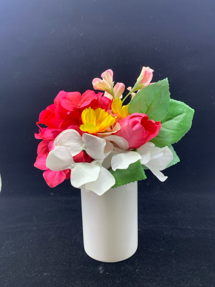 FAUX PINK FLORAL IN WHITE VASE.