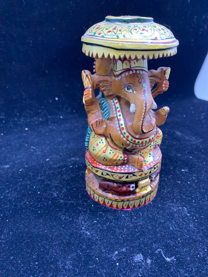 WOOD CARVED ELEPHANT SITTING.