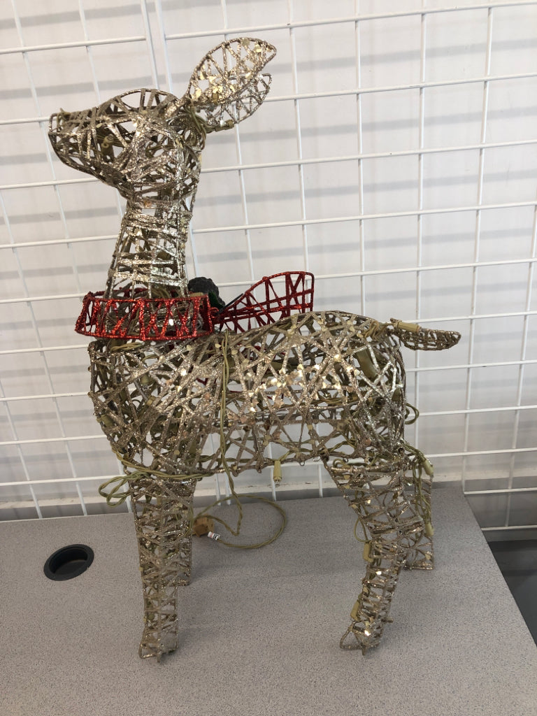 LIGHT UP SILVER GLITTER DEER W/LIGHT UP RIBBON.