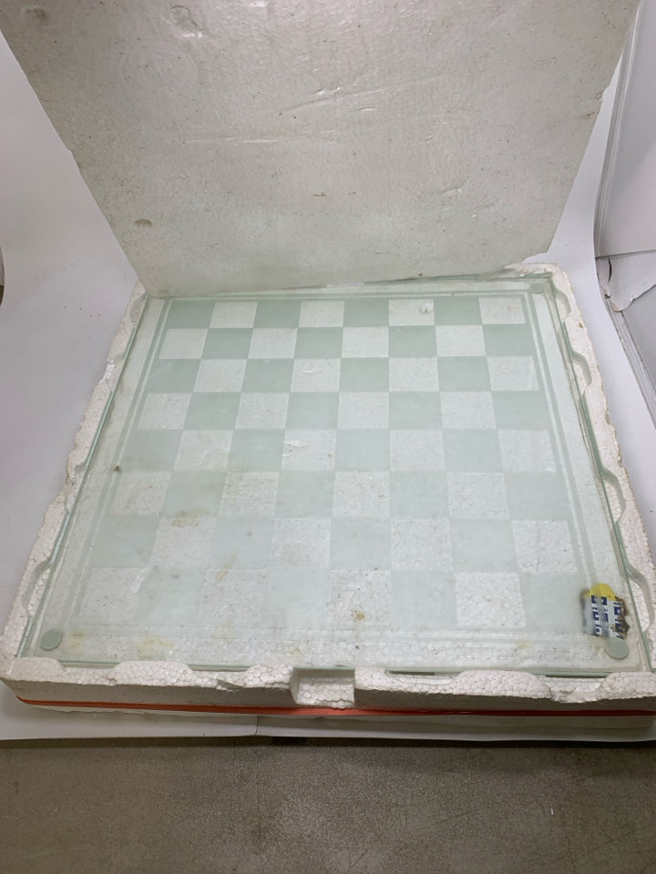 IN STYROFOAM GLASS  CHESS CHECKER BOARD W/ GLASS PIECES.