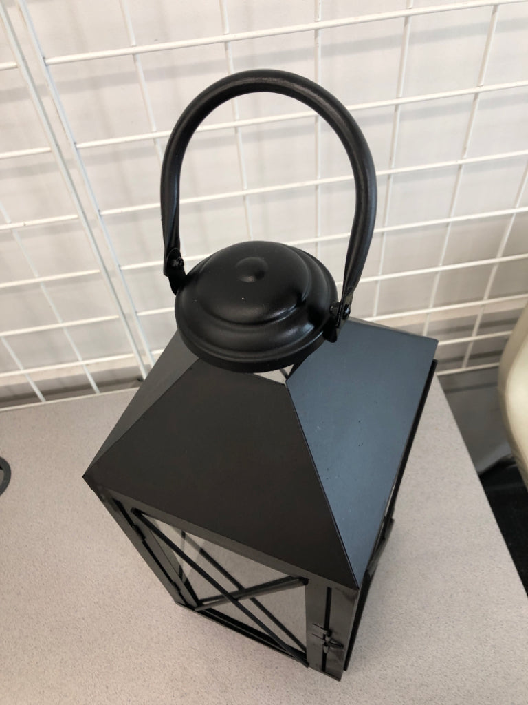 TALL BLACK CANDLE LANTERN.