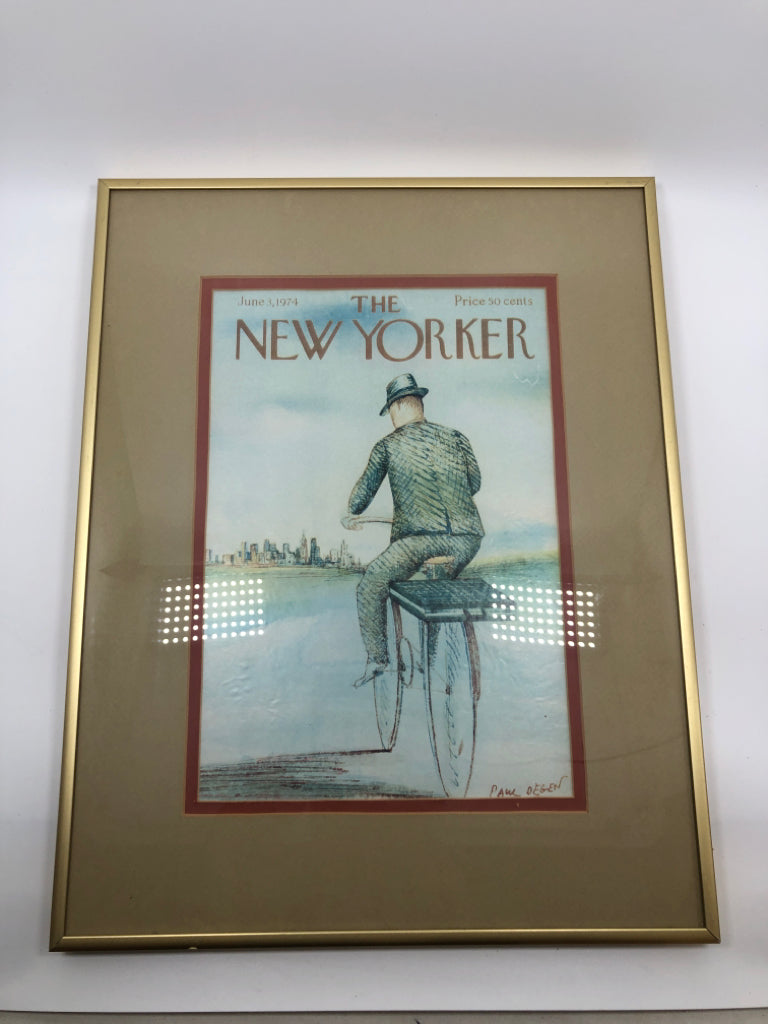MAN ON BIKE THE NEW YORKER PRINT IN GOLD FRAME.