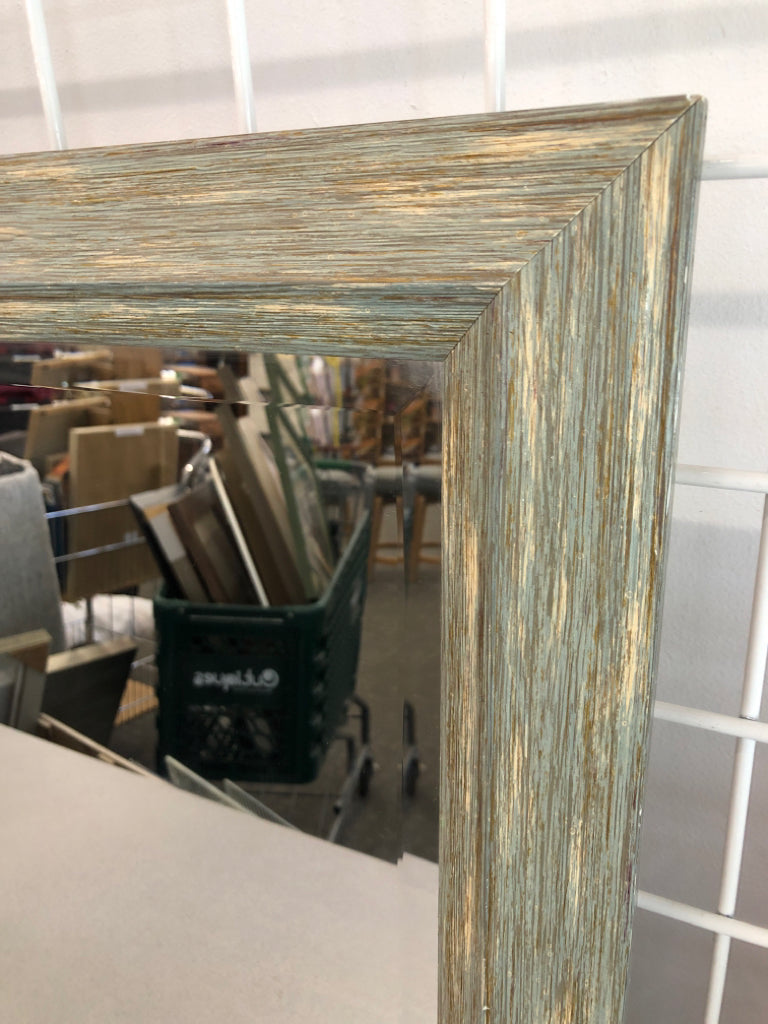 DISTRESSED BLUE WALL MIRROR.