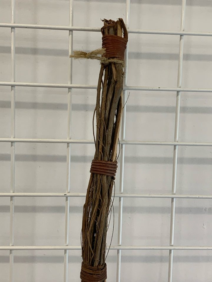 BROWN TWIG BROOM DECOR.