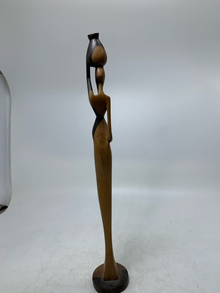 WOOD CARVED FOLK ART WOMAN CARRYING VASE ON HEAD.