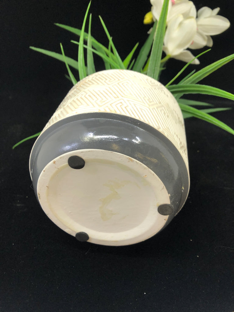 FAUX ORCHID IN TEXTURED CERAMIC PLANTER.