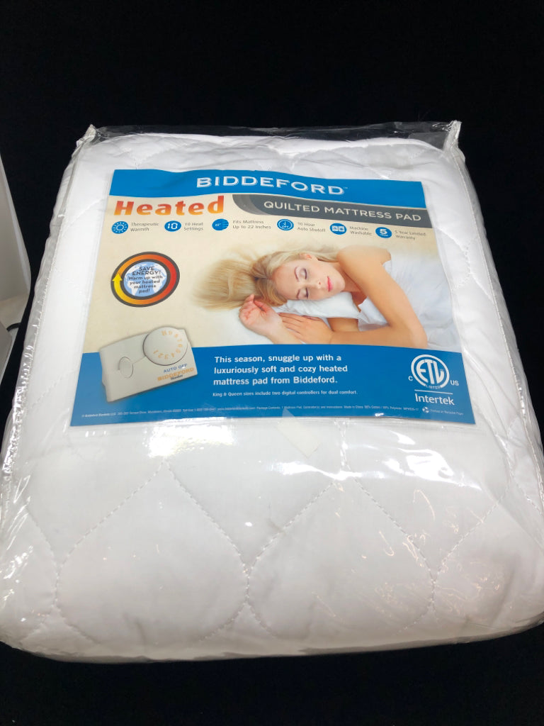 NIP HEATED QUILTED MATTRESS PAD - QUEEN.