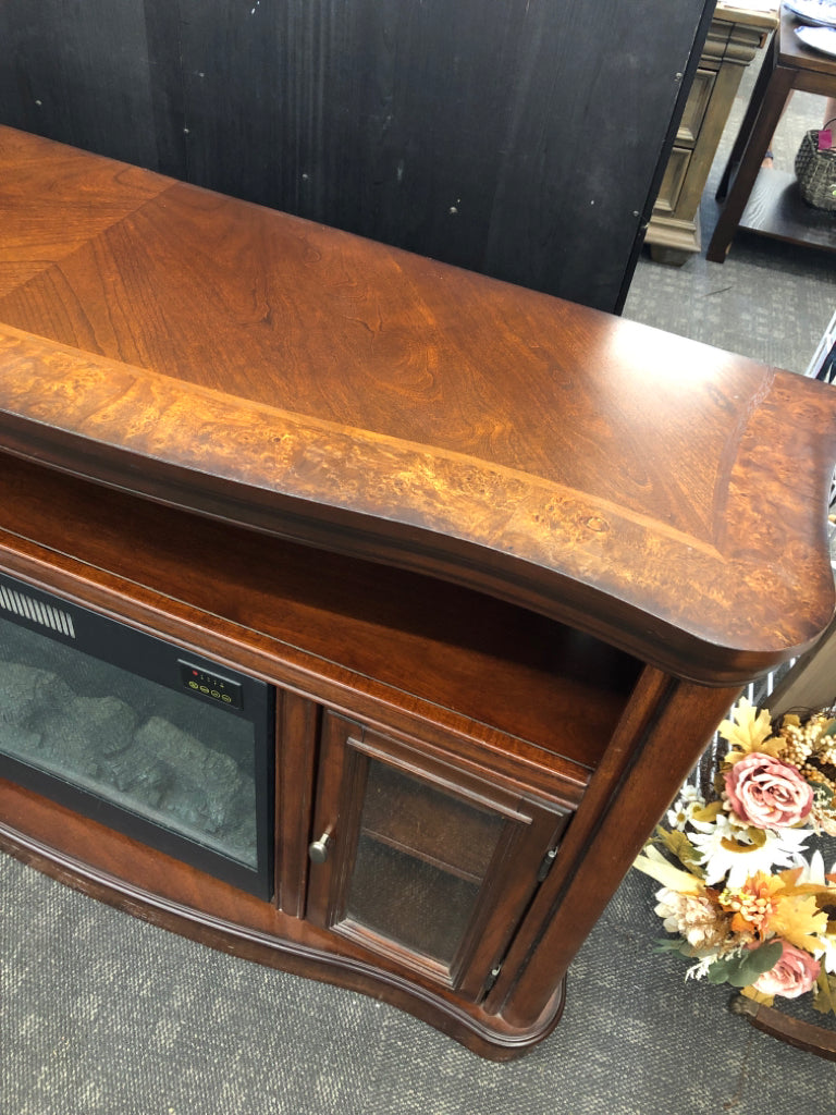 DK WOOD MEDIA CABINET W/FAUX ELECTRIC FIREPLACE.