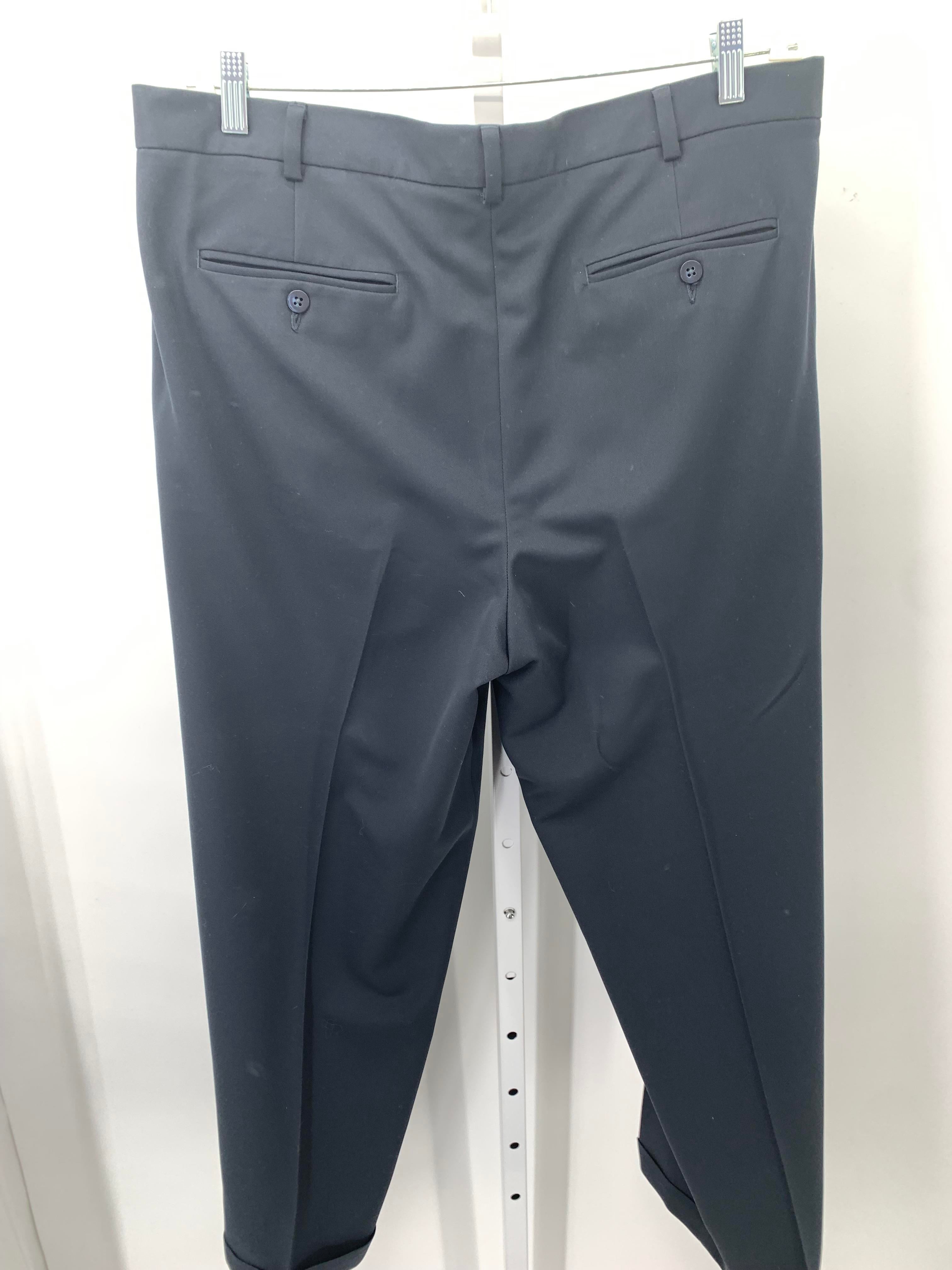 PLEATED FRONT PANTS