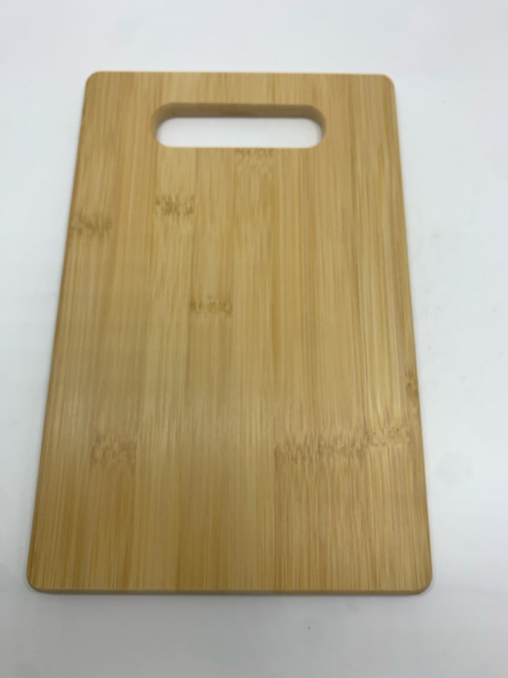IN CELEBRATION CUTTING BOARD.