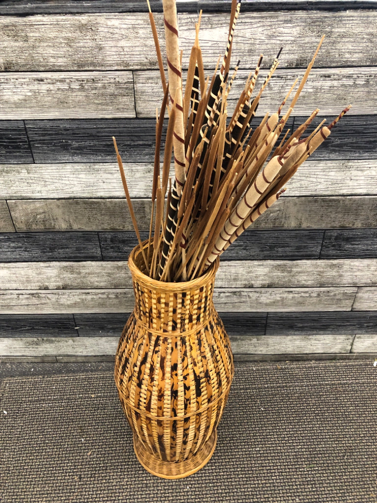 FAUX CAT TAILS IN WOVEN BASKET FLOOR VASE.