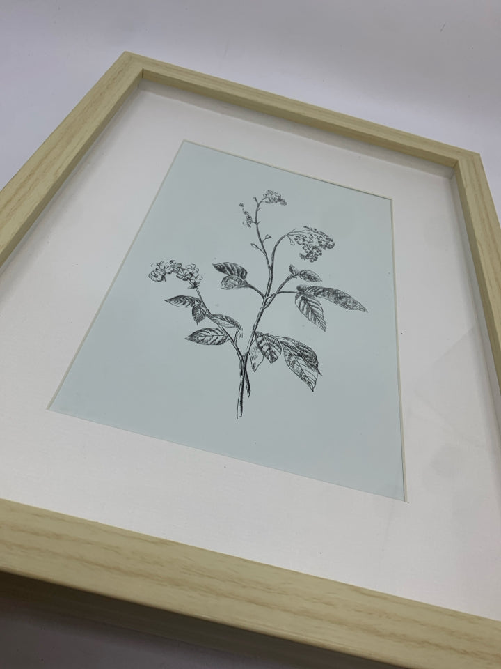 PALE BLUE FLORAL PRINT IN WOOD FRAME.