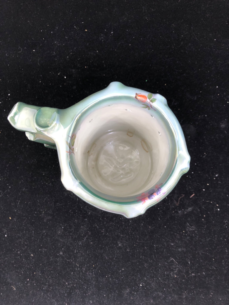VTG WHITE/GREEN CERAMIC STEIN WITH BLACK BIRD.