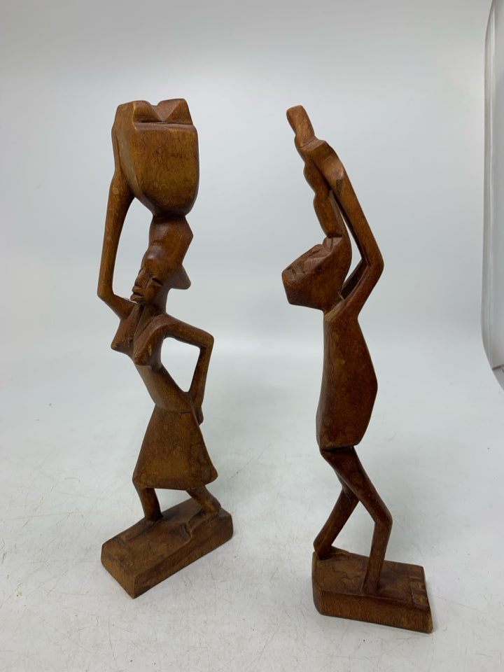 2 LIGHT WOOD CARVED FOLK ART MAN/WOMAN.