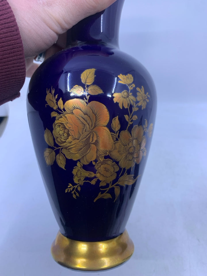 FOOTED COBALT BLUE VASE W/ GOLD ROSES.