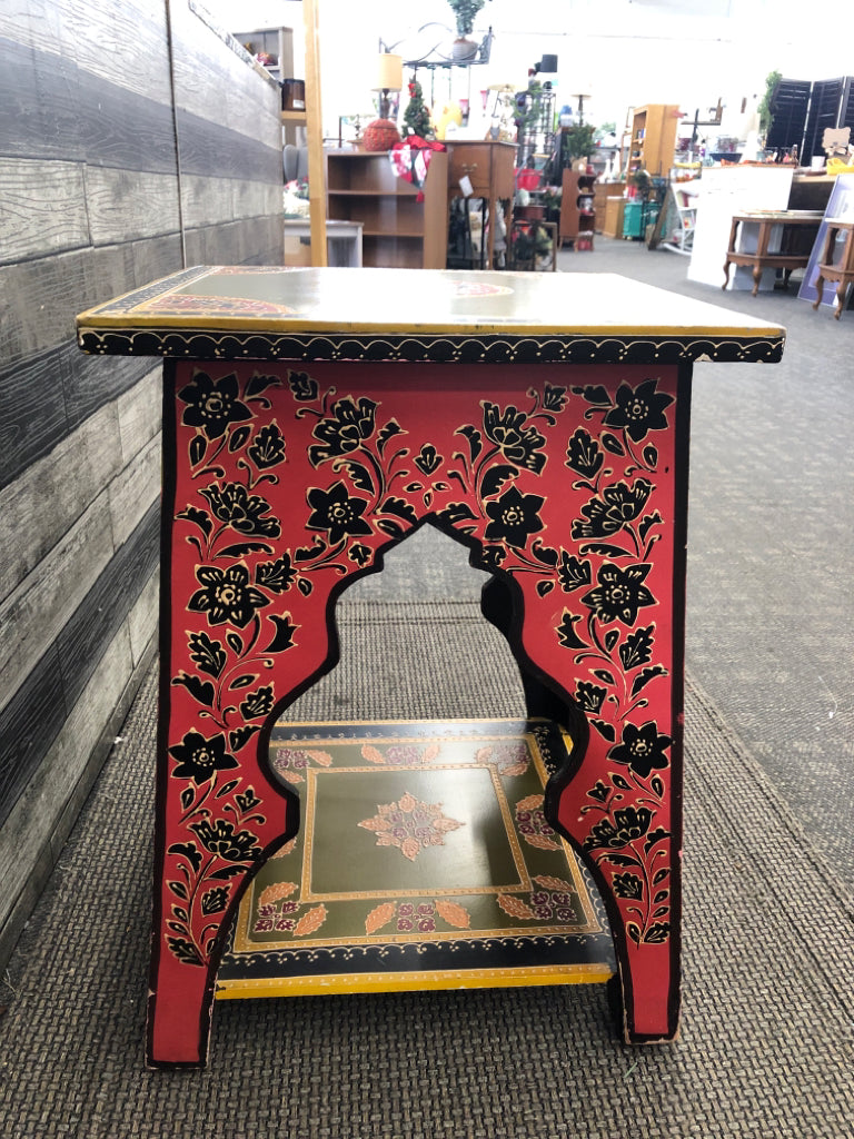 COLORFUL END TABLE W/GREEN TOP & YELLOW BASE & FLORAL LINEWORK.