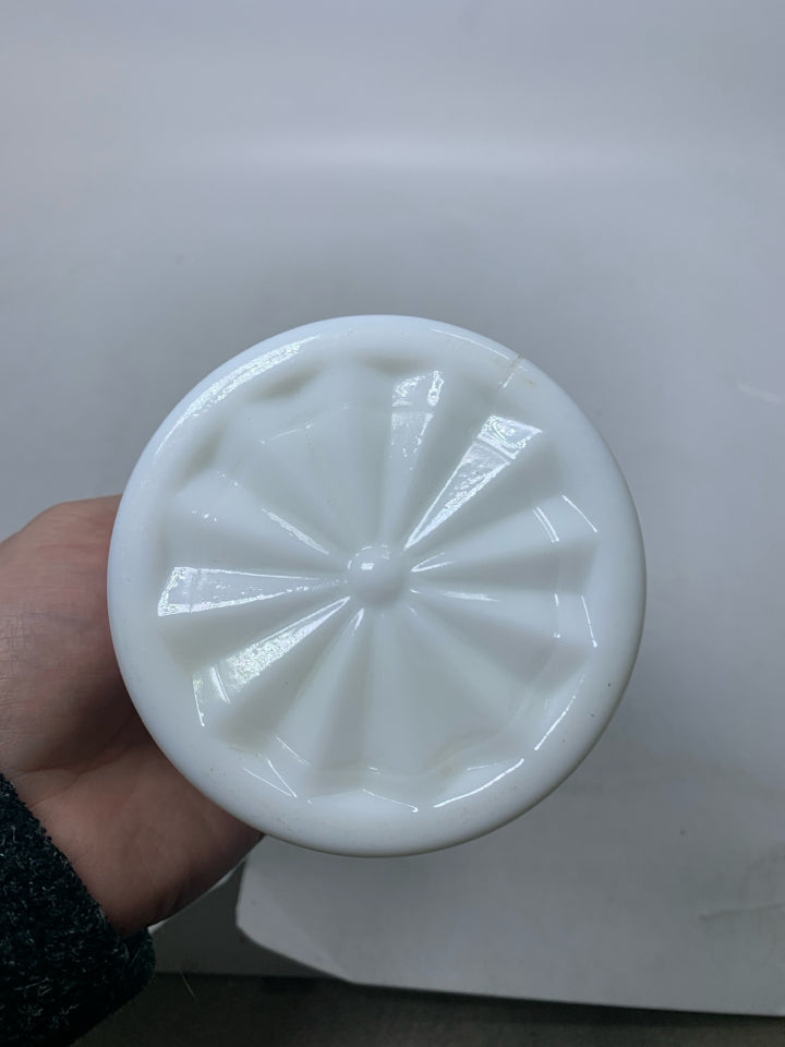 VTG SMALL MILK GLASS CANISTER W/ EAGLE COIN DETAILS.
