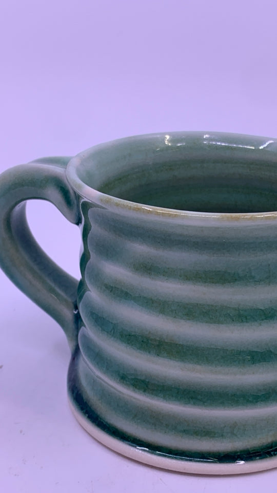 CERAMIC GREEN POTTERY RIBBED MUG.