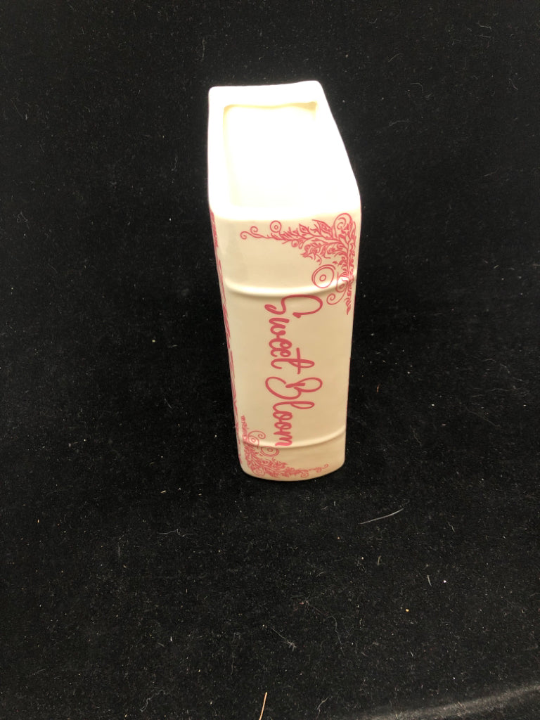 BOOK VASE W/PINK FLORALS.