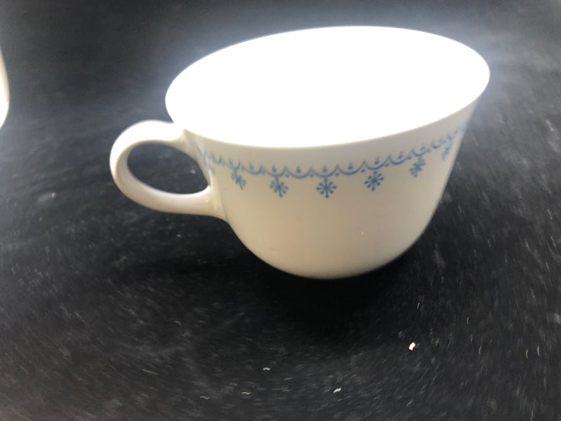 4 BLUE PATTERN CORELLE MUGS.