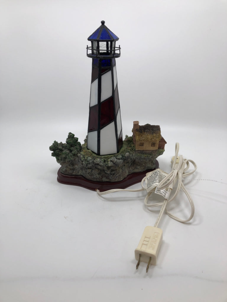 STAINED GLASS LIGHT HOUSE LAMP W/RESIN BASE.