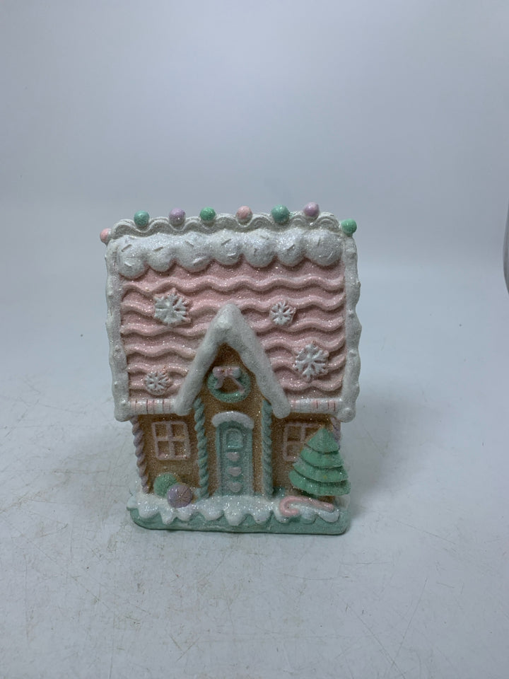 RESIN PASTEL COLORED SPARKLE GINGERBREAD HOUSE.