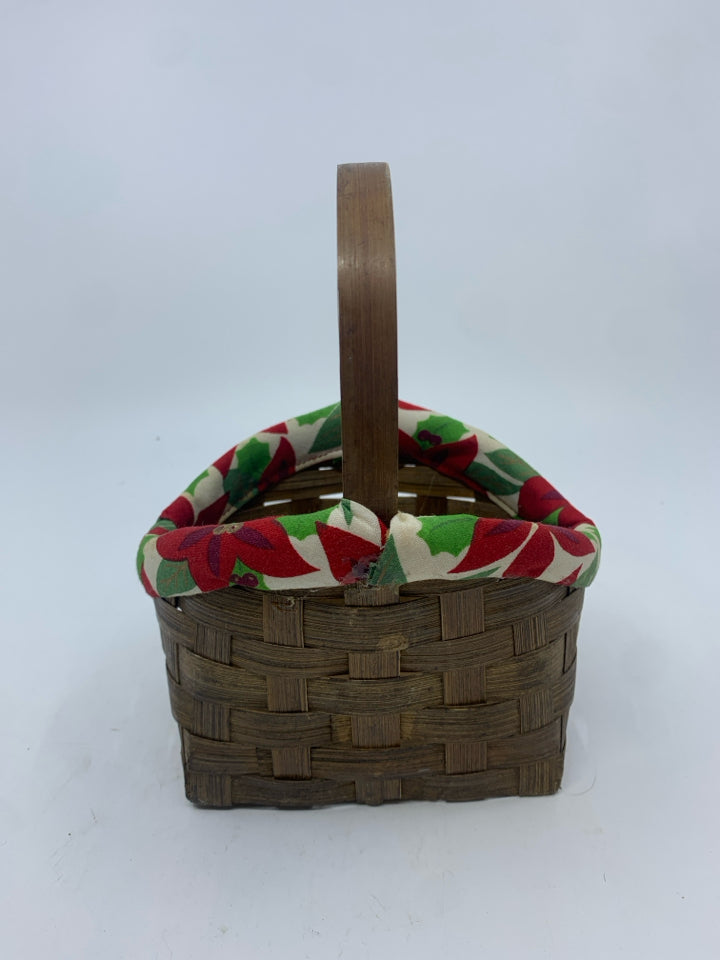 SMALL DARK BASKET W POINSETTIA FABRIC RIM.