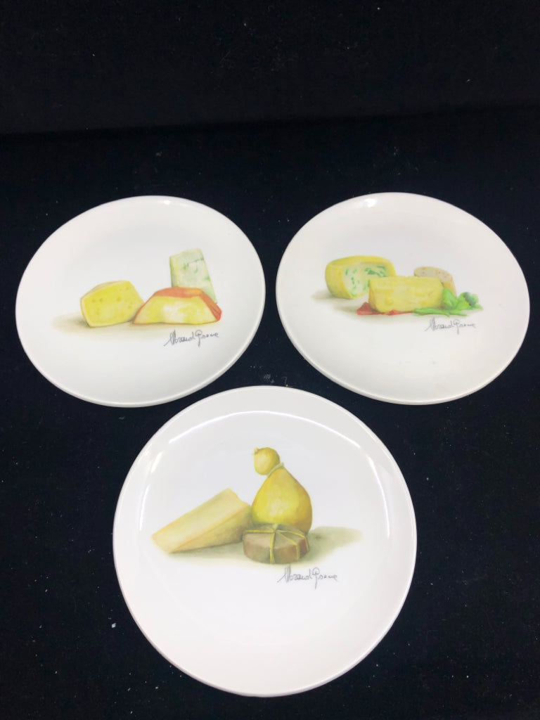 3 WHITE CERAMIC CHEESE PLATES.