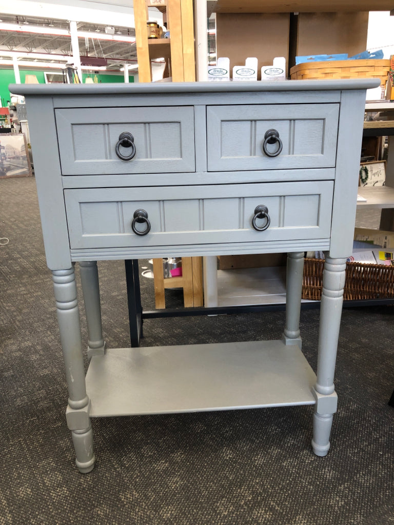 GREY SIDE TABLE W/ 3 DRAWERS.