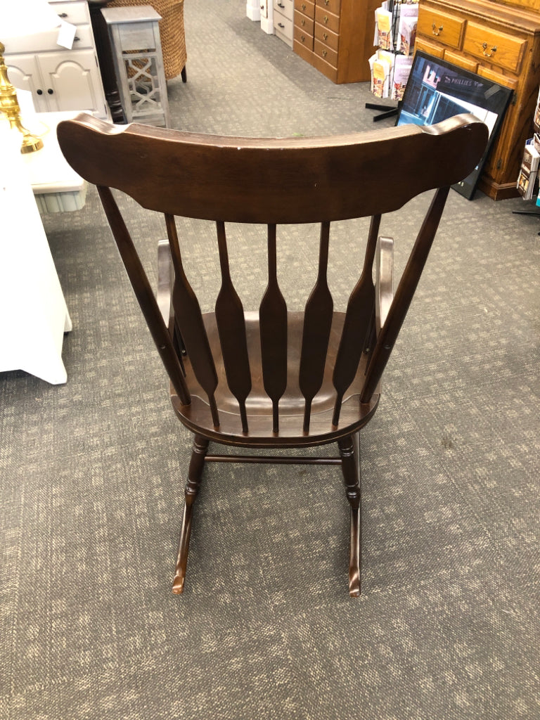 DARK WOOD ROCKING CHAIR.