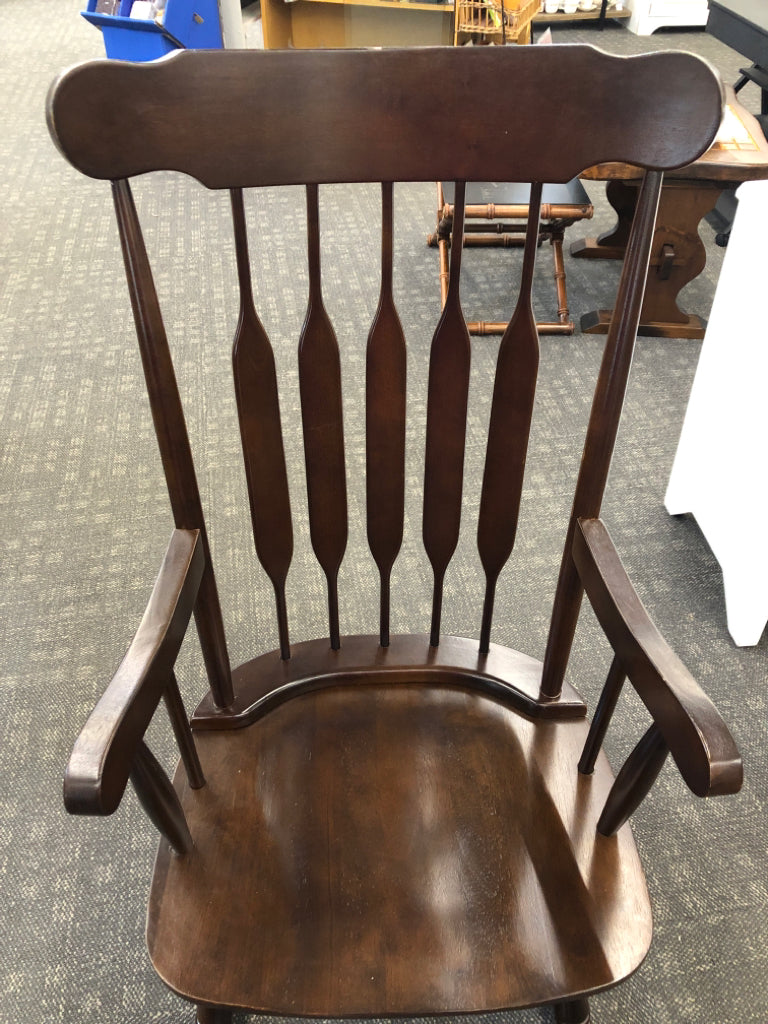 DARK WOOD ROCKING CHAIR.