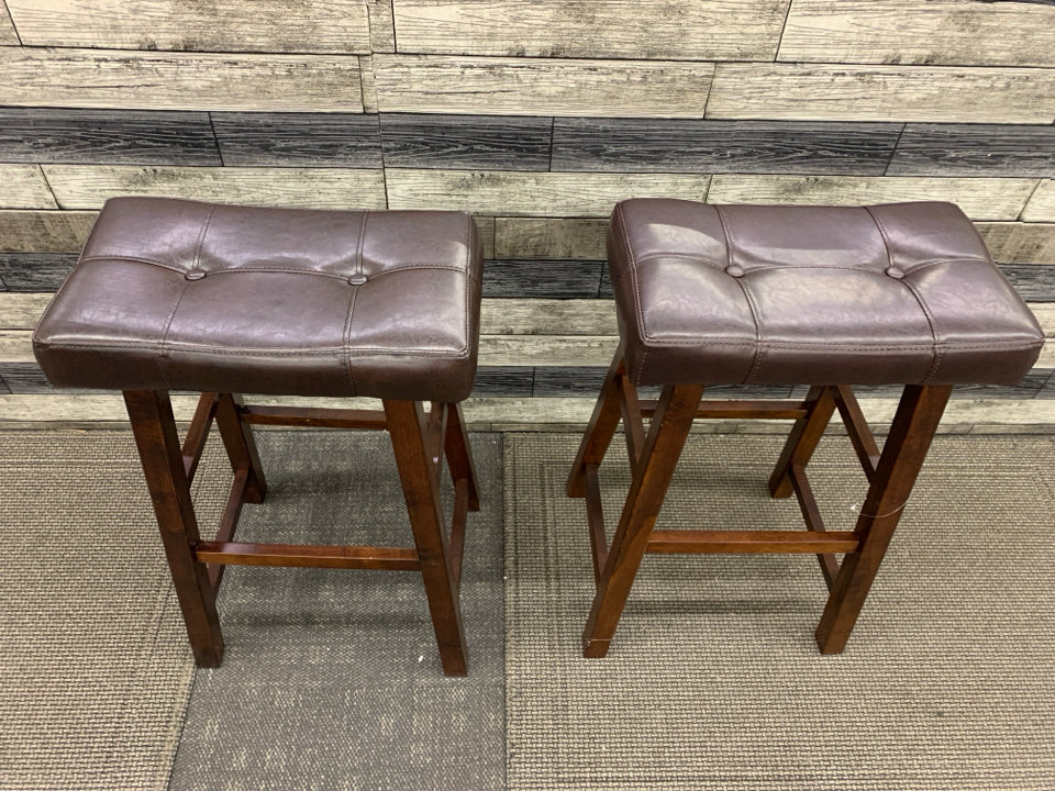 2 LEATHER SADDLE BAR STOOLS.