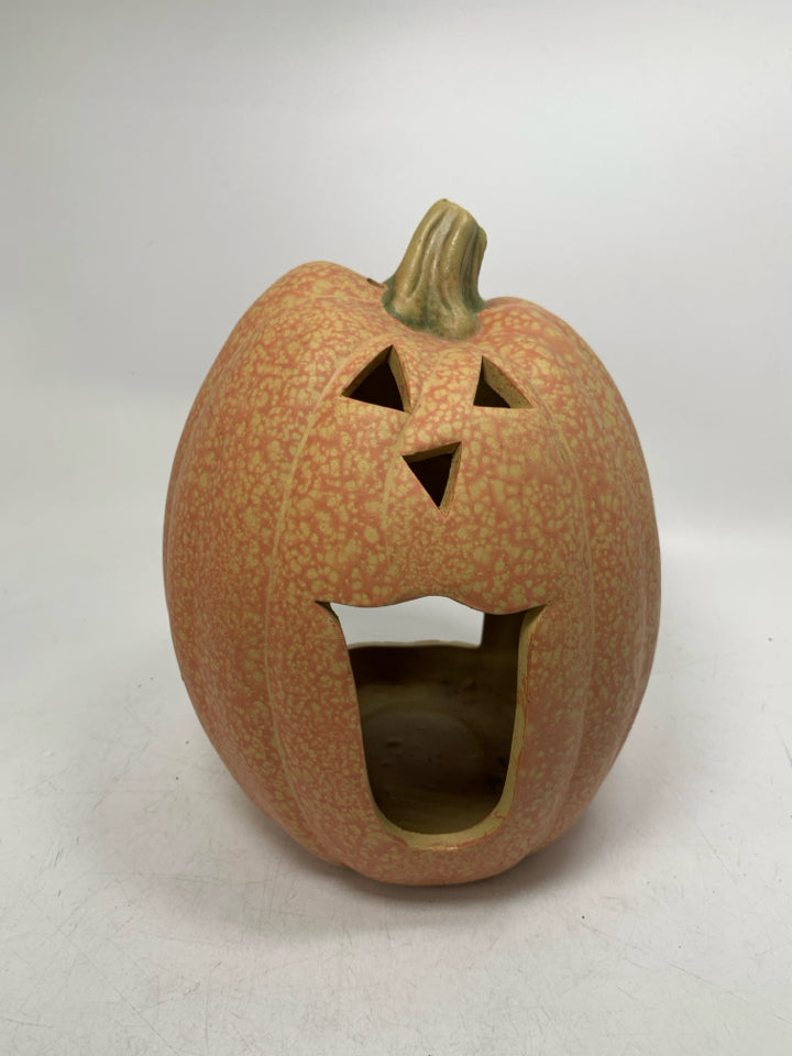 SPECKLED CERAMIC JACKO LANTERN CUTOUT CANDLE HOLDER.