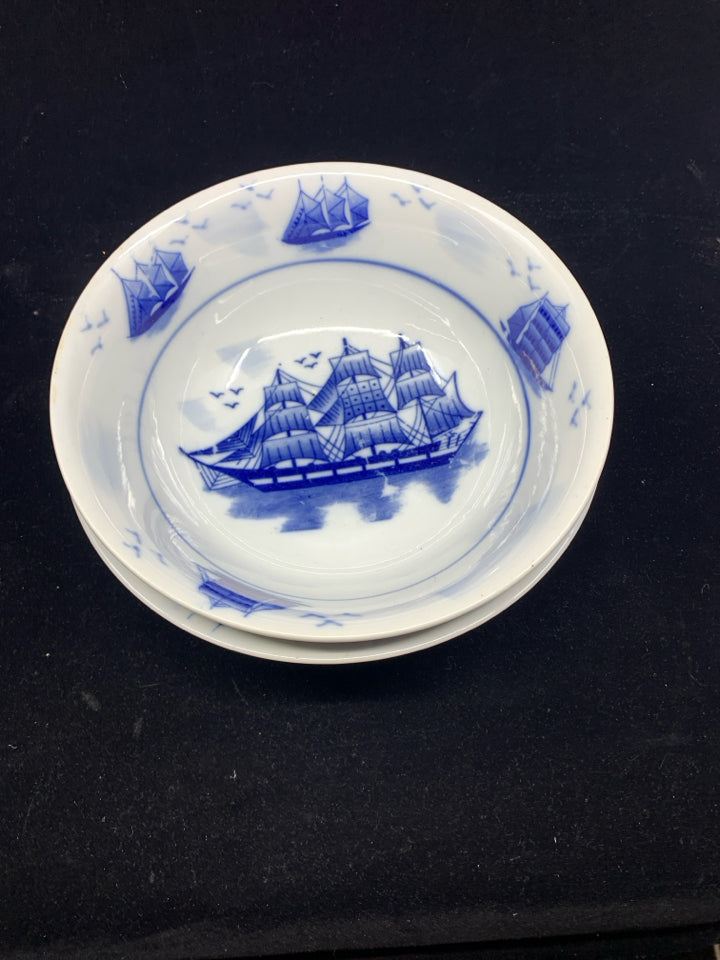 2 BLUE AND WHITE SHIP SERVING BOWLS.