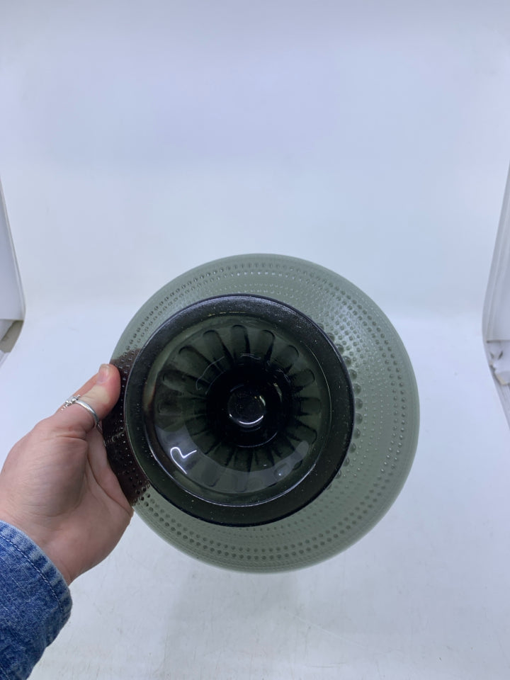 BLACK GLASS FOOTED CAKE STAND W/ EMBOSSED BEADING.