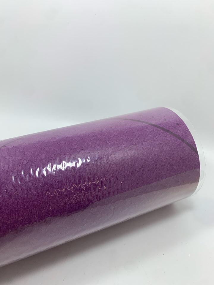 NIP PURPLE YOGA MAT.