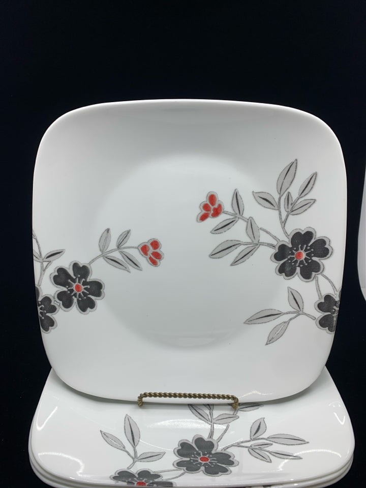 4 CORELLE DINNER PLATES W/RED AND BLACK FLORAL.