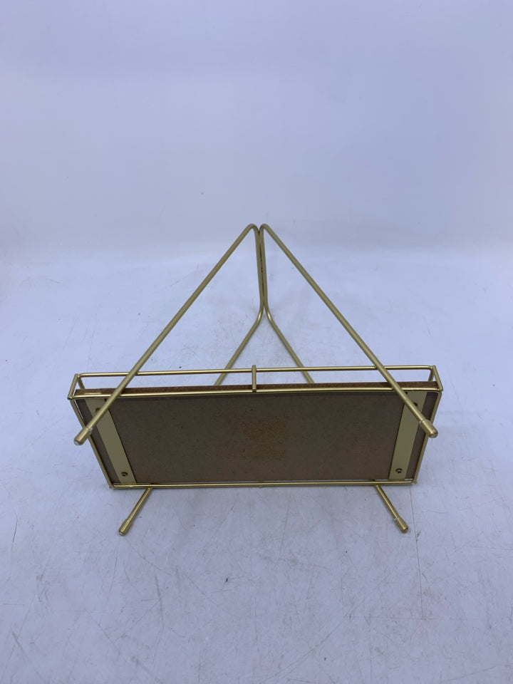 GOLD METAL TRIANGLE SHAPED SMALL SHELF.