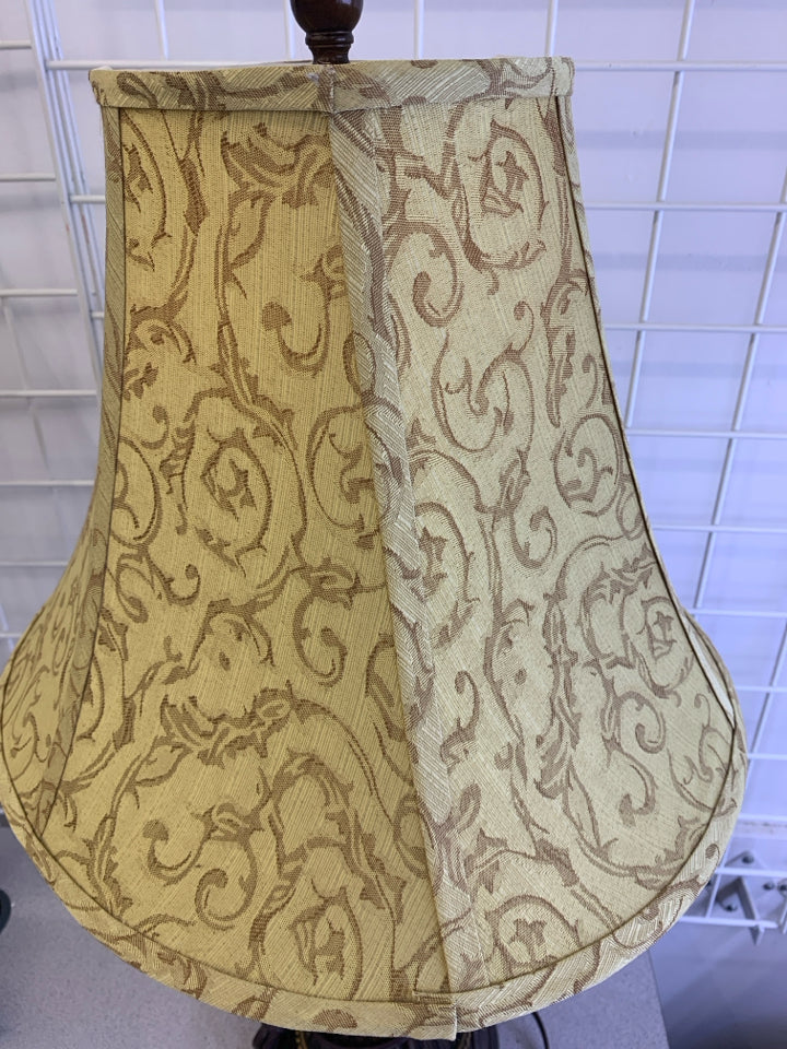 BROWN WOOD GOLD SWIRL TABLE LAMP WITH GOLD SWIRL SHADE.