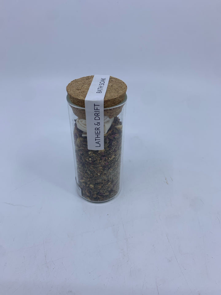 NIP LATHER AND DRIFT BATH SOAK.