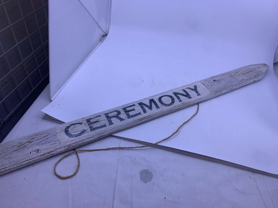 WHITE DISTRESSED CEREMONY ARROW SIGN.