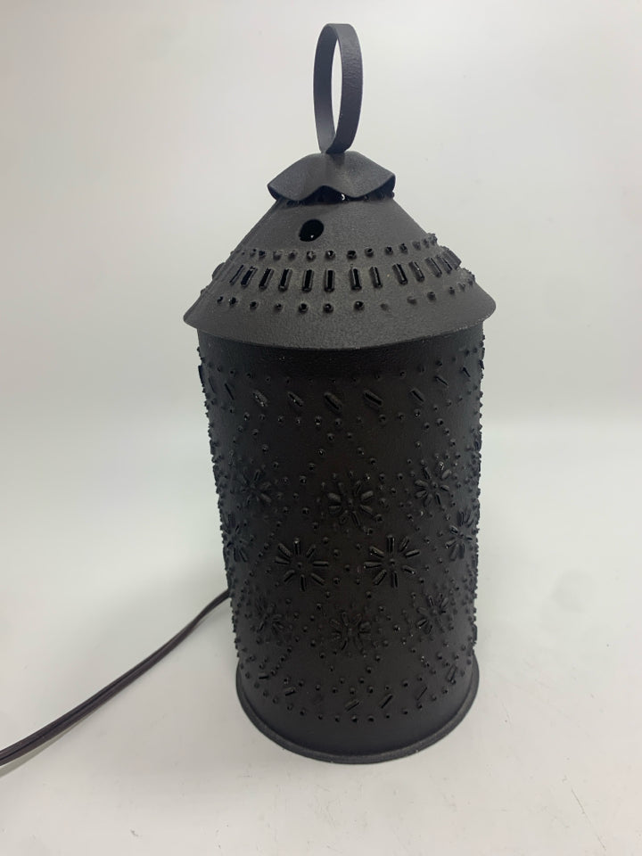 PUNCHED BROWN METAL LANTERN.